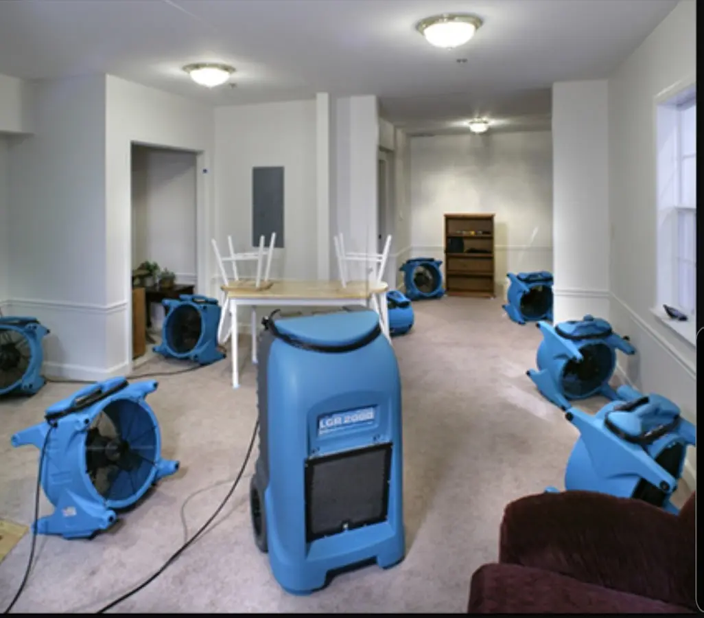 Air movers and dehumidifier setup for Water Damage Restoration in Severance